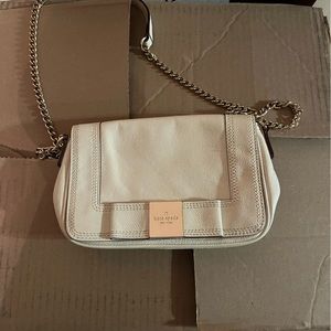 Small crème colored kate spade purse